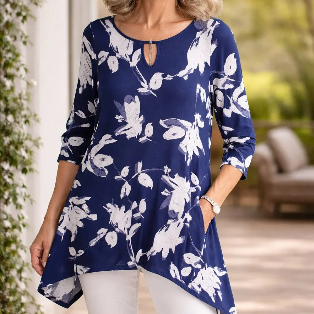 Clara Sun Woo USA Tunic Top Stretch Floral Print Sharkbite Hem size M Relaxed